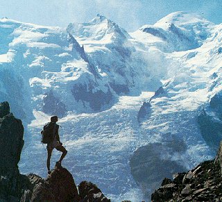 A hiker views the northern flanks of Mont Blanc.